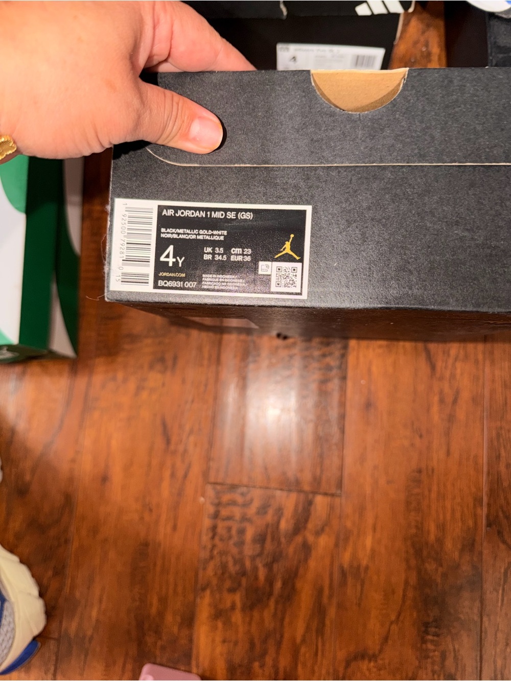 Jordan Black and Metallic Gold Men's Sneakers Box Label